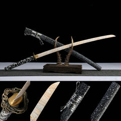 千机变 katana with fire-pattern blade, coiled dragon tsuba, and speckled lacquered wood saya