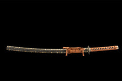 Wide studio view of 噬魂渊 katana and plum dragon saya on a wooden stand