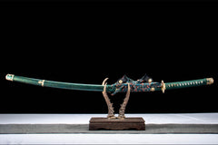 Green Sakura 1060 Damascus Steel Tachi blade and fittings detail