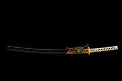 Wide studio view of 星陨·断时 katana and gloss black saya on a wooden stand
