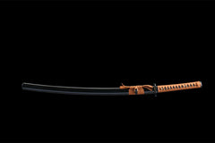 Wide studio view of 承影流光 katana and gloss black saya on a wooden stand