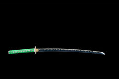 Close-up of 惊蛰 blade showing the midnight flame pattern in the 1045 steel