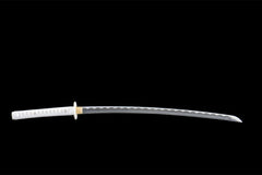 Close-up of 冰魄凝光 blade showing the silver finish and wave temper pattern