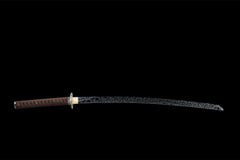 Fenchengjie Katana drawn from scabbard showing curved 1045 carbon steel blade with brushed pattern