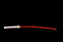 Close-up of 蚀骨红莲 blade showing the crimson lotus-style layered pattern