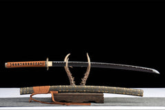 Detailed view of 噬魂渊 drawn beside the embossed saya and brown sageo