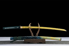 Detailed view of 青冥引 drawn beside the blue gold saya and green sageo