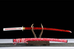 Detailed view of 蚀骨红莲 drawn beside the floral red saya and red-white sageo