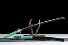Upper saya close-up of 惊蛰 highlighting the black piano-lacquer finish