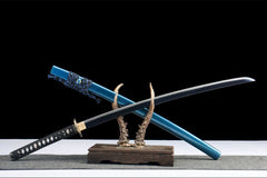 Close-up of 松间鹤唳 tsuka wrap with black cotton ito and bamboo mekugi