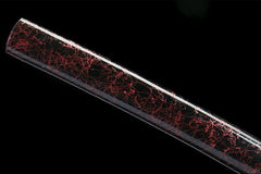 Saya mouth and cord detail of 暗夜魔瞳 showing the lacquer finish and sageo
