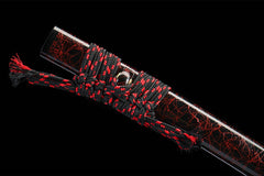 Textured close-up of 惊鸿照影 saya under light with its peacock red crackle surface