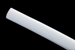 Textured close-up of 霜刃未试 white saya under studio light