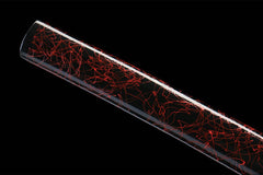 Braided sageo knot and crackle-finish saya detail on 惊鸿照影