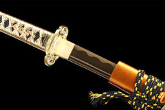 Braided black-and-gold sageo knot on 星陨·断时