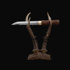 Premium Mystery Tanto — Rosewood Whisper shown on a full antler display stand; specific design is not guaranteed